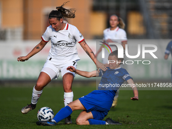 Gloria Marinelli of Milan Women battles for the ball with Sara Borello of Freedom Cuneo during the Women's Coppa Italia match between Freedo...