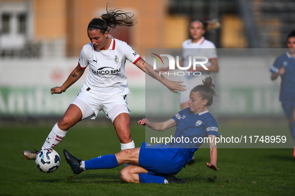 Gloria Marinelli of Milan Women battles for the ball with Sara Borello of Freedom Cuneo during the Women's Coppa Italia match between Freedo...