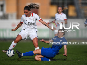 Gloria Marinelli of Milan Women battles for the ball with Sara Borello of Freedom Cuneo during the Women's Coppa Italia match between Freedo...