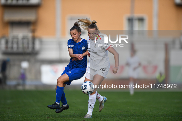 Sara Borello of Freedom Cuneo battles for the ball with Nikola Karczewska of Milan Women during the Women Coppa Italia match between Freedom...