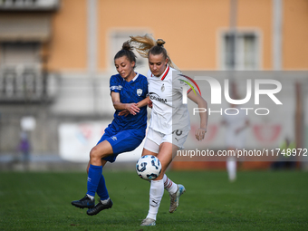 Sara Borello of Freedom Cuneo battles for the ball with Nikola Karczewska of Milan Women during the Women Coppa Italia match between Freedom...