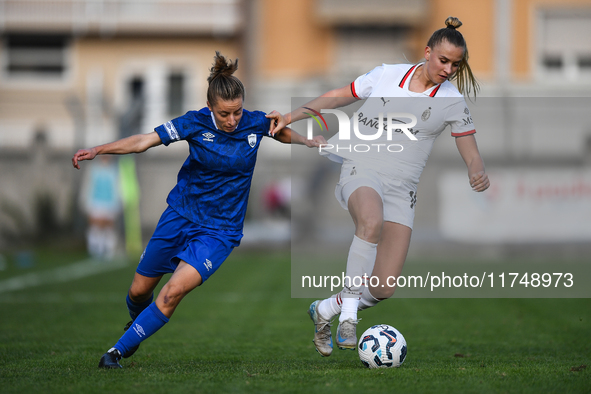 Sara Borello of Freedom Cuneo battles for the ball with Nikola Karczewska of Milan Women during the Women Coppa Italia match between Freedom...