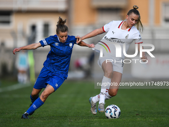 Sara Borello of Freedom Cuneo battles for the ball with Nikola Karczewska of Milan Women during the Women Coppa Italia match between Freedom...