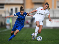 Sara Borello of Freedom Cuneo battles for the ball with Nikola Karczewska of Milan Women during the Women Coppa Italia match between Freedom...