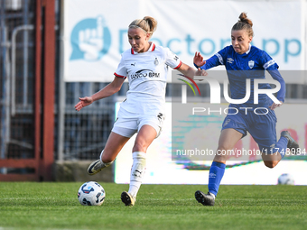 Emma Koivisto of Milan Women battles for the ball with Sea Borello of Freedom Cuneo during the Women's Coppa Italia match between Freedom Cu...