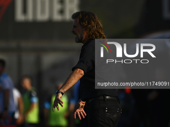 Insua, coach of Barracas Central, gives instructions to his team players during a Liga Profesional 2024 match between Barracas Central and R...