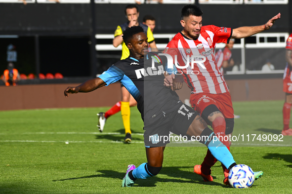 Johan Carbonero of Racing Club competes for the ball against a player from Barracas Central during a Liga Profesional 2024 match between Bar...