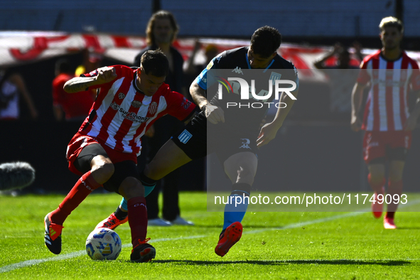 Juan Ignacio Nardoni of Racing Club competes for the ball against Facundo Mater of Barracas Central during a Liga Profesional 2024 match bet...