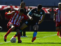 Juan Ignacio Nardoni of Racing Club competes for the ball against Facundo Mater of Barracas Central during a Liga Profesional 2024 match bet...