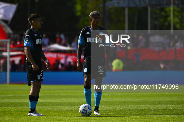 Player X of Racing Club competes for the ball against Player X of Barracas Central during a Liga Profesional 2024 match between Barracas Cen...