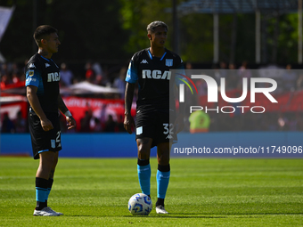 Player X of Racing Club competes for the ball against Player X of Barracas Central during a Liga Profesional 2024 match between Barracas Cen...