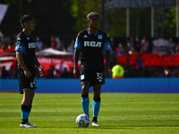 Player X of Racing Club competes for the ball against Player X of Barracas Central during a Liga Profesional 2024 match between Barracas Cen...