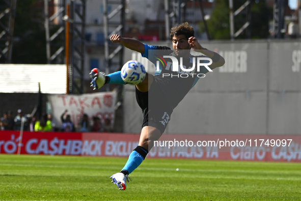 Santiago Sosa of Racing Club kicks the ball during a Liga Profesional 2024 match between Barracas Central and Racing Club at Estadio Guiller...