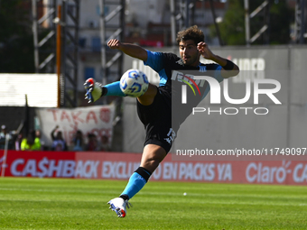 Santiago Sosa of Racing Club kicks the ball during a Liga Profesional 2024 match between Barracas Central and Racing Club at Estadio Guiller...