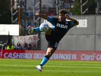 Santiago Sosa of Racing Club kicks the ball during a Liga Profesional 2024 match between Barracas Central and Racing Club at Estadio Guiller...