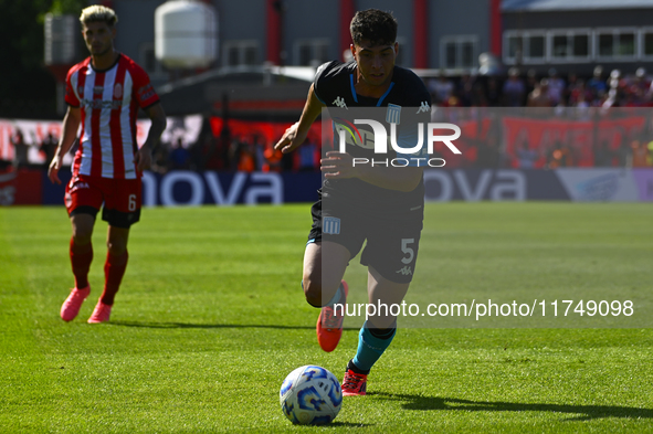 Juan Ignacio Nardoni of Racing Club drives the ball during a Liga Profesional 2024 match between Barracas Central and Racing Club at Estadio...