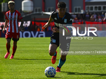 Juan Ignacio Nardoni of Racing Club drives the ball during a Liga Profesional 2024 match between Barracas Central and Racing Club at Estadio...