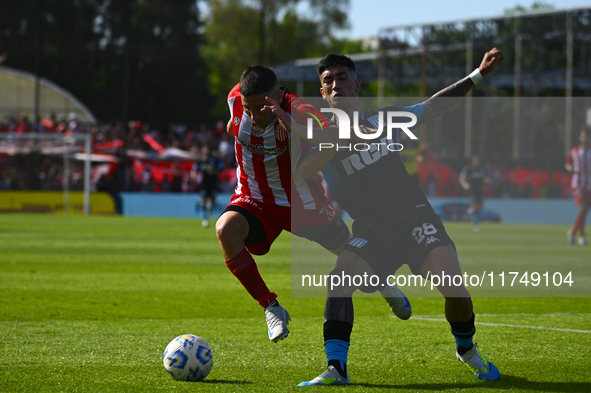 Santiago Solari of Racing Club and Facundo Mater of Barracas Central participate in a Liga Profesional 2024 match between Barracas Central a...