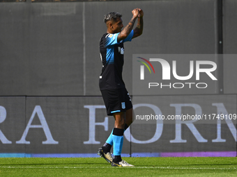 Agustin Almendra of Racing Club celebrates after scoring the team's first goal during a Liga Profesional 2024 match between Barracas Central...