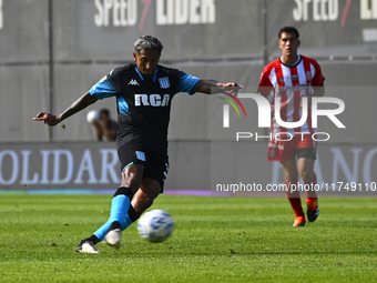 Agustin Almendra of Racing Club kicks the ball during a Liga Profesional 2024 match between Barracas Central and Racing Club at Estadio Guil...