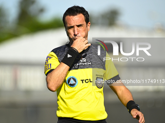 The referee Pablo Dovalo gestures during a Liga Profesional 2024 match between Barracas Central and Racing Club at Guillermo Laza in Buenos...