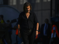 Insua, coach of Barracas Central, gives instructions to his team players during a Liga Profesional 2024 match between Barracas Central and R...