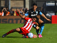 Maximiliano Salas of Racing Club competes for the ball against Maximiliano Puig of Barracas Central during a Liga Profesional 2024 match bet...