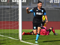 Adrian Martinez of Racing Club celebrates after scoring the team's first goal during a Liga Profesional 2024 match between Barracas Central...