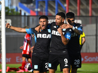 Adrian Martinez of Racing Club celebrates after scoring the team's first goal during a Liga Profesional 2024 match between Barracas Central...