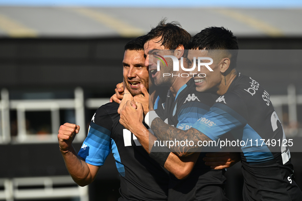 Adrian Martinez, Santiago Sosa, and Santiago Solari of Racing Club celebrate after scoring the team's first goal during a Liga Profesional 2...