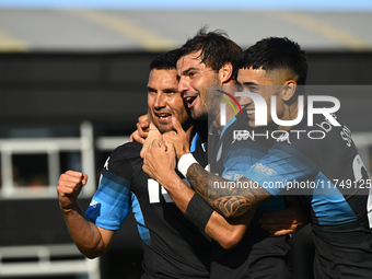 Adrian Martinez, Santiago Sosa, and Santiago Solari of Racing Club celebrate after scoring the team's first goal during a Liga Profesional 2...