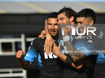 Adrian Martinez, Santiago Sosa, and Santiago Solari of Racing Club celebrate after scoring the team's first goal during a Liga Profesional 2...