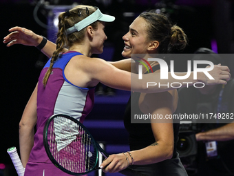 RIYADH, SAUDI ARABIA - NOVEMBER 06: Aryna Sabalenka (L) of Belarus congratulates Elena Rybakina of Kazakhstan at the end of the match, on Da...