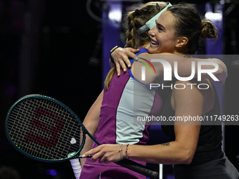 RIYADH, SAUDI ARABIA - NOVEMBER 06: Aryna Sabalenka (L) of Belarus congratulates Elena Rybakina of Kazakhstan at the end of the match, on Da...