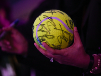 RIYADH, SAUDI ARABIA - NOVEMBER 06: A fan waits for Elena Rybakina of Kazakhstan after her win against Aryna Sabalenka of Belarus, on Day 5...