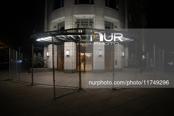 Fencing around a building near the White House remains in place following ex-President and convicted felon Donald Trump's win in the 2024 pr...