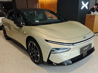 Xiaopeng's first AI car, the P7+, is displayed at its flagship store in Shanghai, China, on November 7, 2024. (