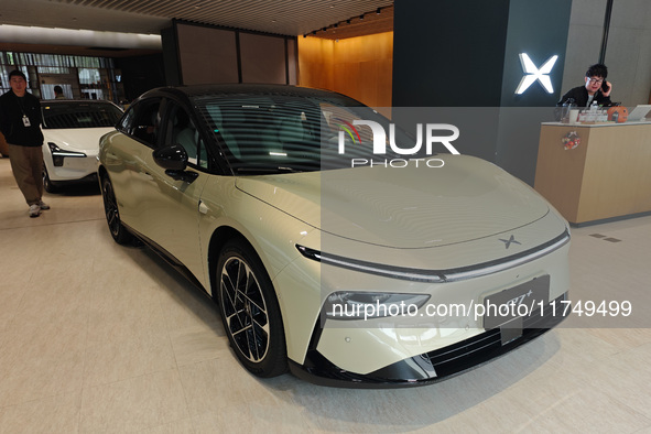 Xiaopeng's first AI car, the P7+, is displayed at its flagship store in Shanghai, China, on November 7, 2024. 