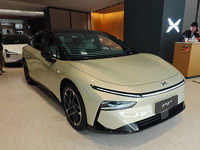 Xiaopeng's first AI car, the P7+, is displayed at its flagship store in Shanghai, China, on November 7, 2024. (