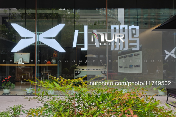 Xiaopeng's first AI car, the P7+, is displayed at its flagship store in Shanghai, China, on November 7, 2024. 