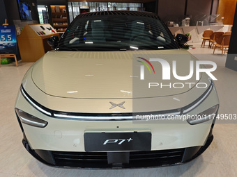 Xiaopeng's first AI car, the P7+, is displayed at its flagship store in Shanghai, China, on November 7, 2024. (