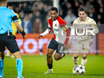 Feyenoord Rotterdam midfielder Quinten Timber and Red Bull Salzburg midfielder Oscar Gloukh play during the match between Feyenoord and Salz...