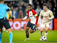 Feyenoord Rotterdam midfielder Quinten Timber and Red Bull Salzburg midfielder Oscar Gloukh play during the match between Feyenoord and Salz...