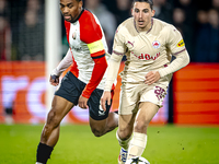 Feyenoord Rotterdam midfielder Quinten Timber and Red Bull Salzburg midfielder Oscar Gloukh play during the match between Feyenoord and Salz...