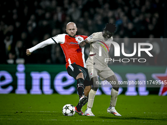 Feyenoord Rotterdam defender Gernot Trauner and Red Bull Salzburg forward Karim Konate participate in the match between Feyenoord and Salzbu...