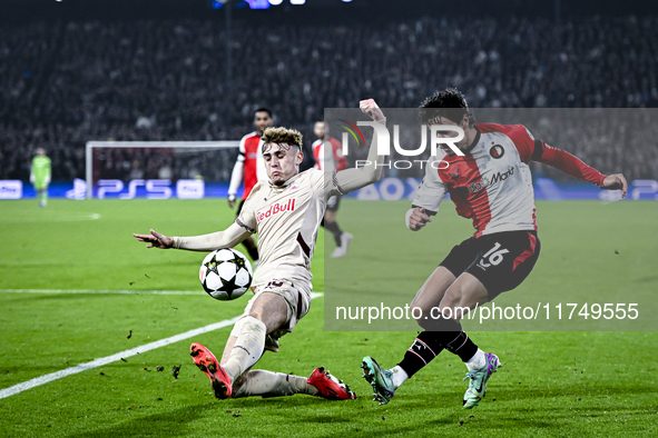 Red Bull Salzburg midfielder Bobby Clark and Feyenoord Rotterdam defender Hugo Bueno play during the match between Feyenoord and Salzburg at...