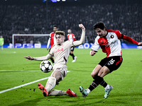 Red Bull Salzburg midfielder Bobby Clark and Feyenoord Rotterdam defender Hugo Bueno play during the match between Feyenoord and Salzburg at...