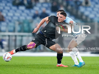 Roberto Piccoli of Cagliari Calcio and Mario Gila of SS Lazio compete for the ball during the Serie A Enilive match between SS Lazio and Cag...