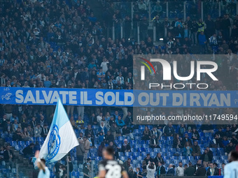 Supporters of SS Lazio show a banner during the Serie A Enilive match between SS Lazio and Cagliari Calcio at Stadio Olimpico on November 4,...