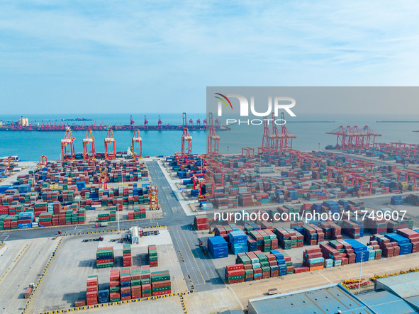 A photo taken on November 7, 2024, shows a working scene at the container terminal of Rizhao Port in Rizhao, China. 